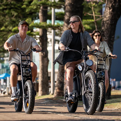 3 People Riding Cooly Bikes together